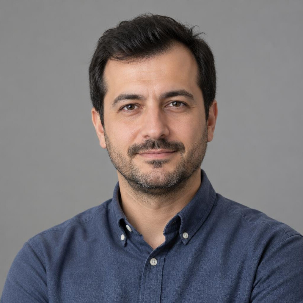 Portrait of a bearded man in a casual shirt