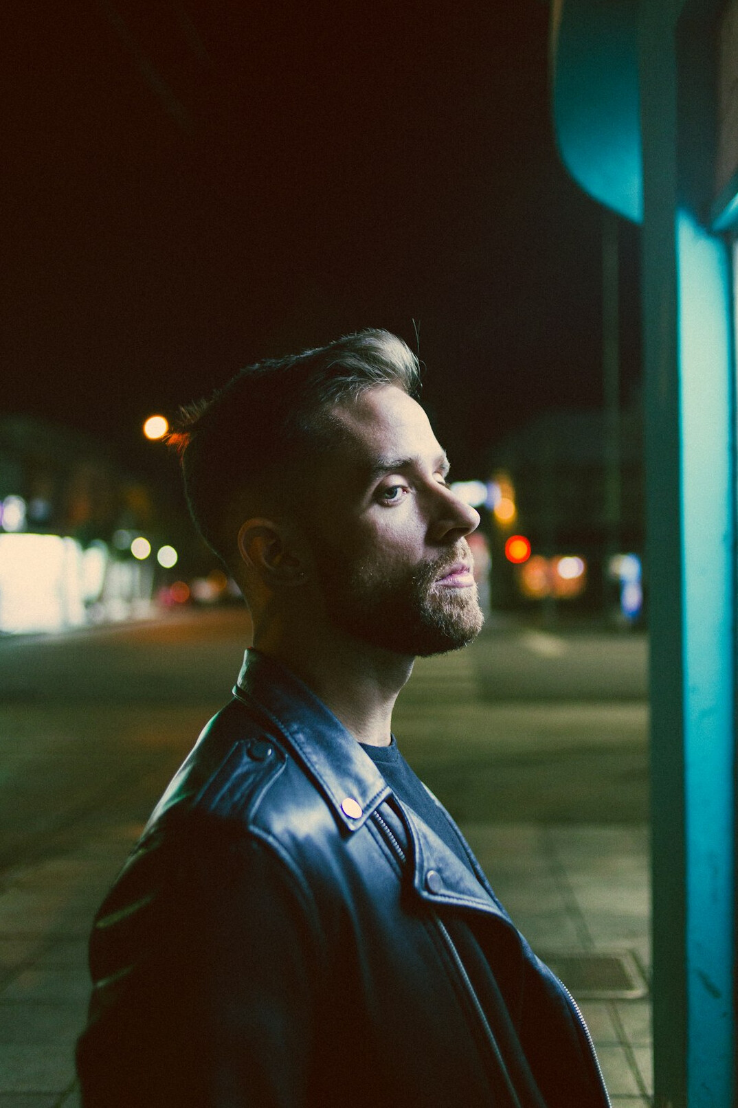 Portrait of a man with short hair and a light beard